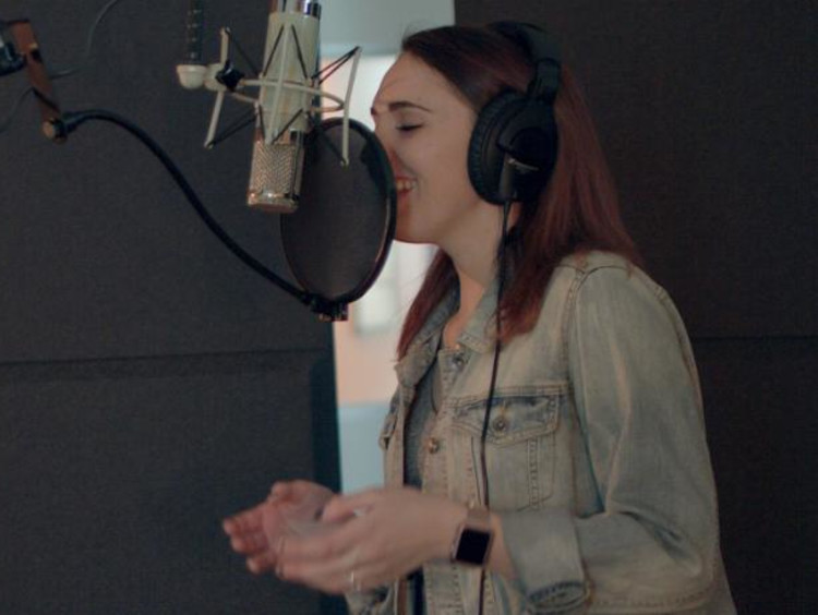 kristyn marie singing in the studio