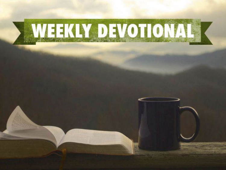 Mountain background with weekly devotional text over open book and coffee mug
