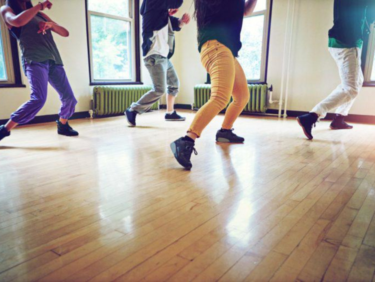 Dancers on a wooden floor