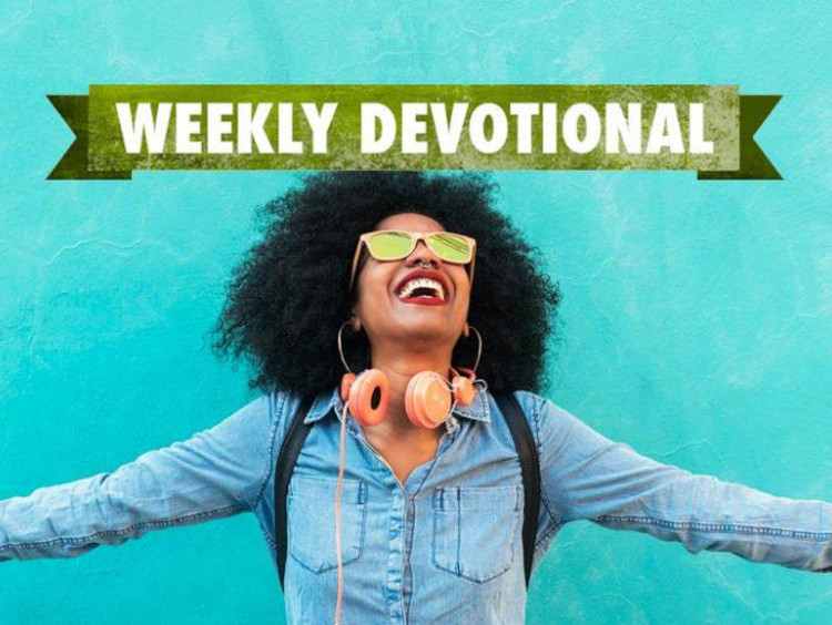 Weekly Devotional: Girl with headphones with arms stretched out