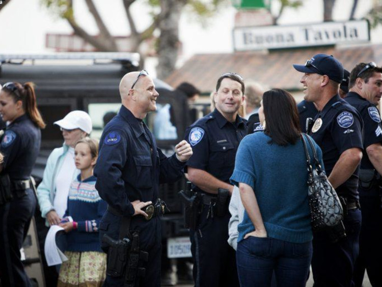 police officers talking to people