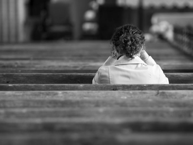 girl sitting in church