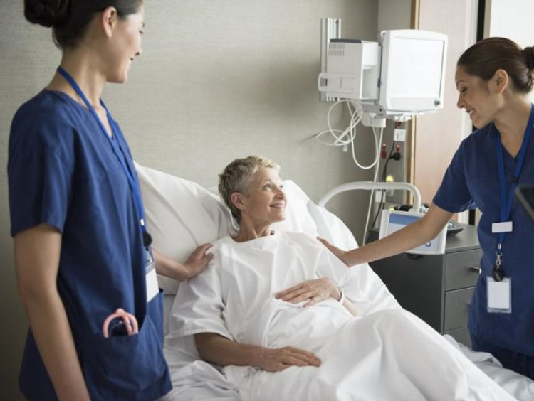 Nurses attending a patient 