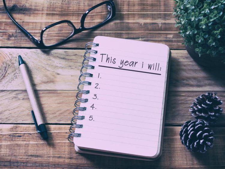 A notebook open to a page about new resolutions