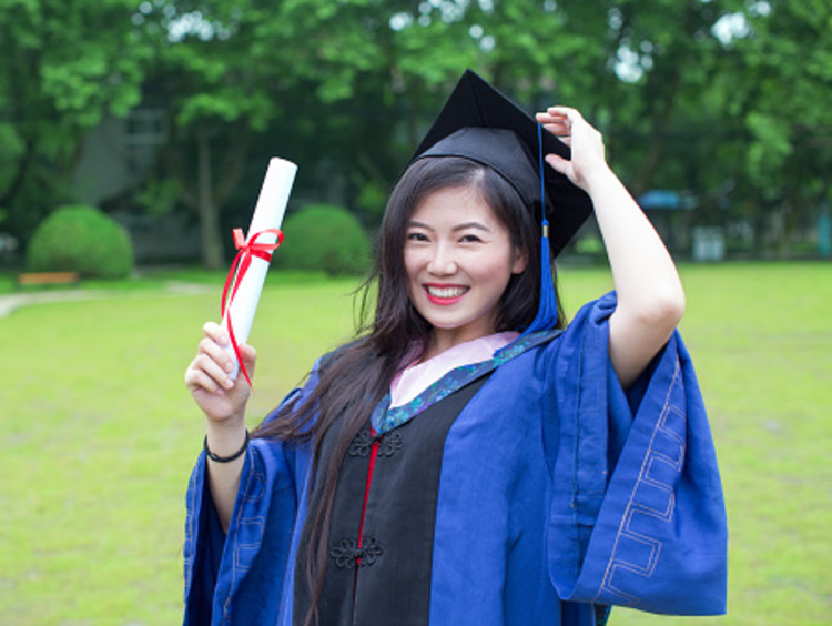 communications student graduating with degree