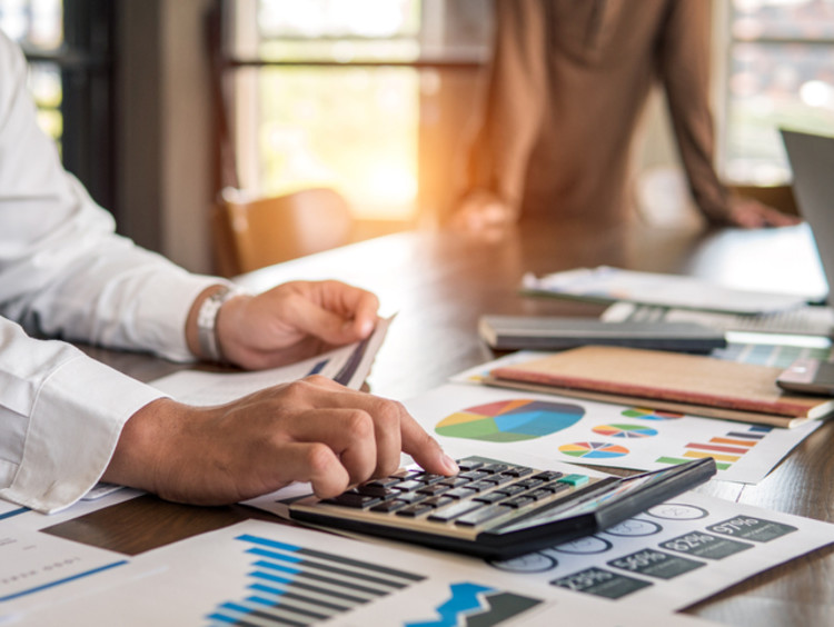 Businessman works on a financial report