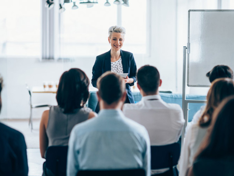business leader talking to a group of people
