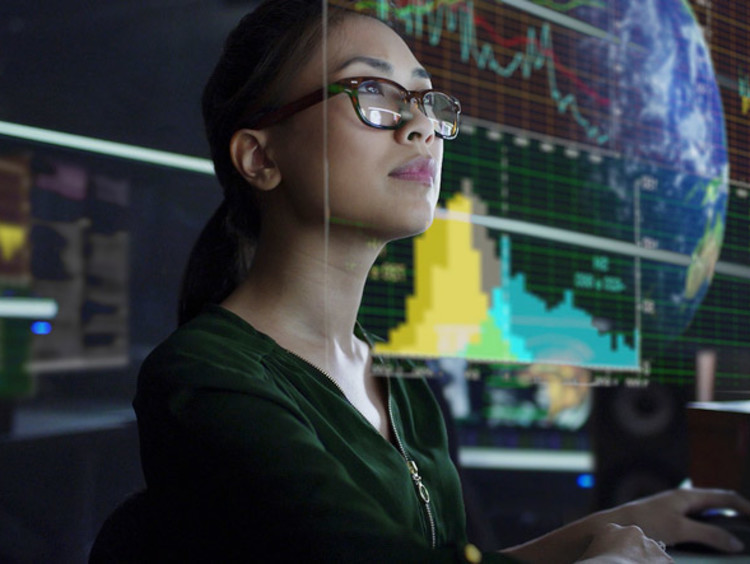 girl looking at tech data