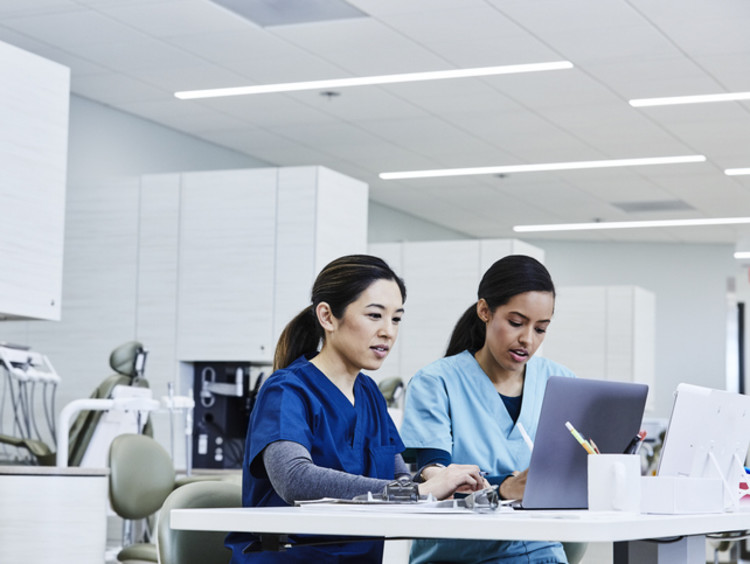 two registered nurses working in hospital