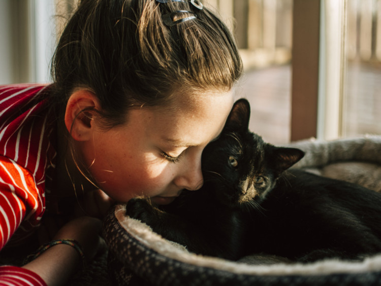 young girl with cat learning to let go of fear