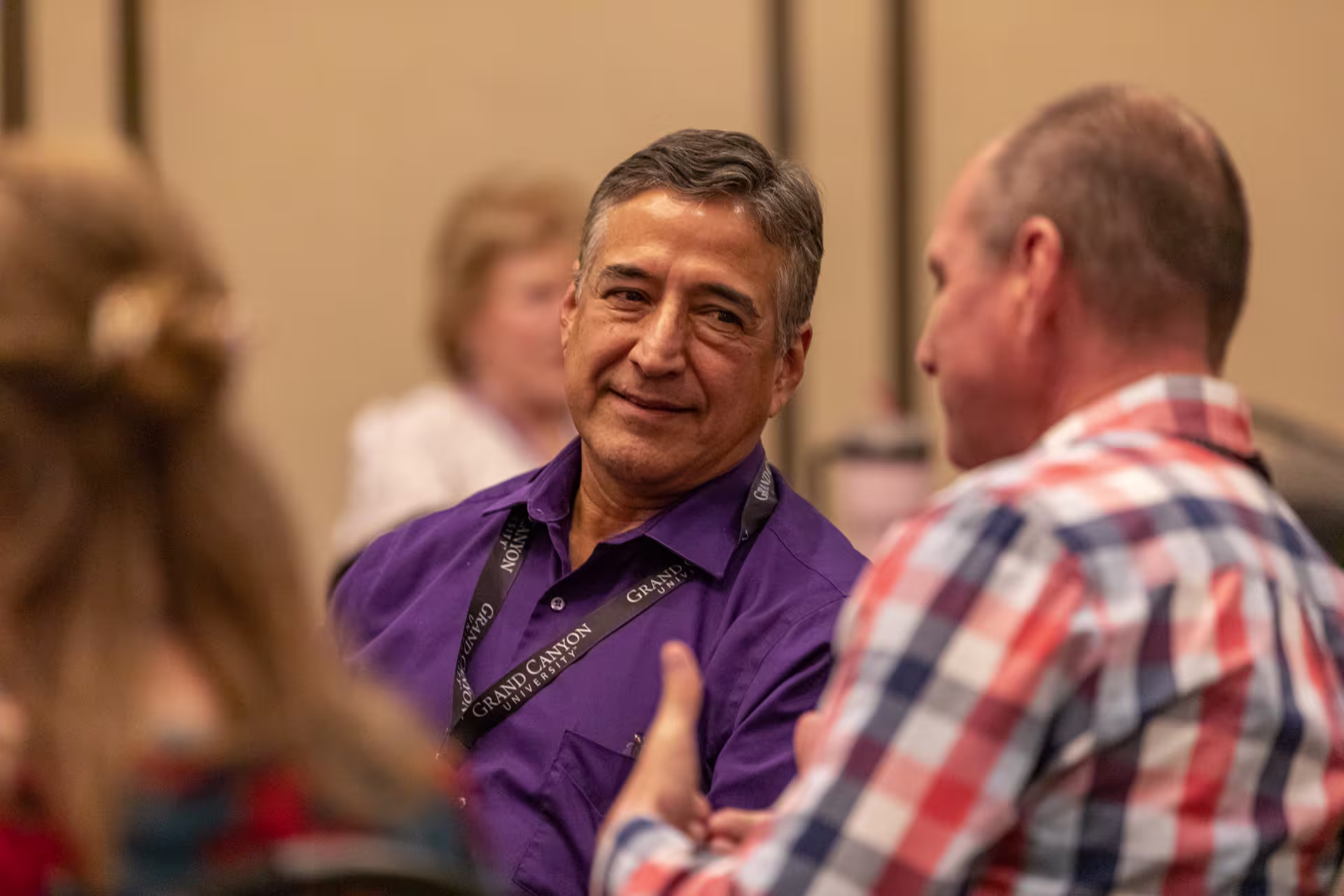 english-teacher-speaking-with-colleague