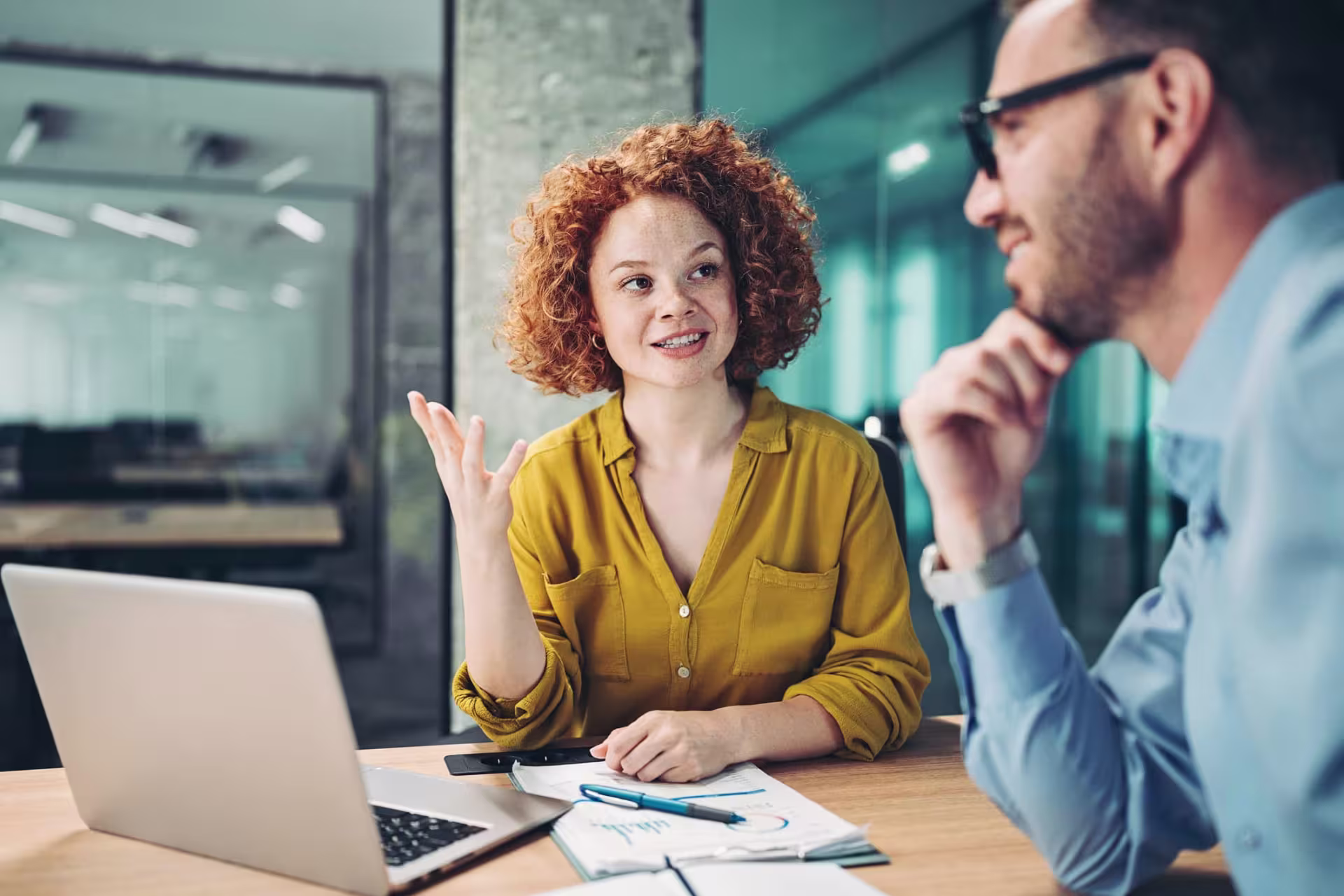 Two graduate students discussing innovation and entrepreneurship in the Advanced Graduate Certificate program.