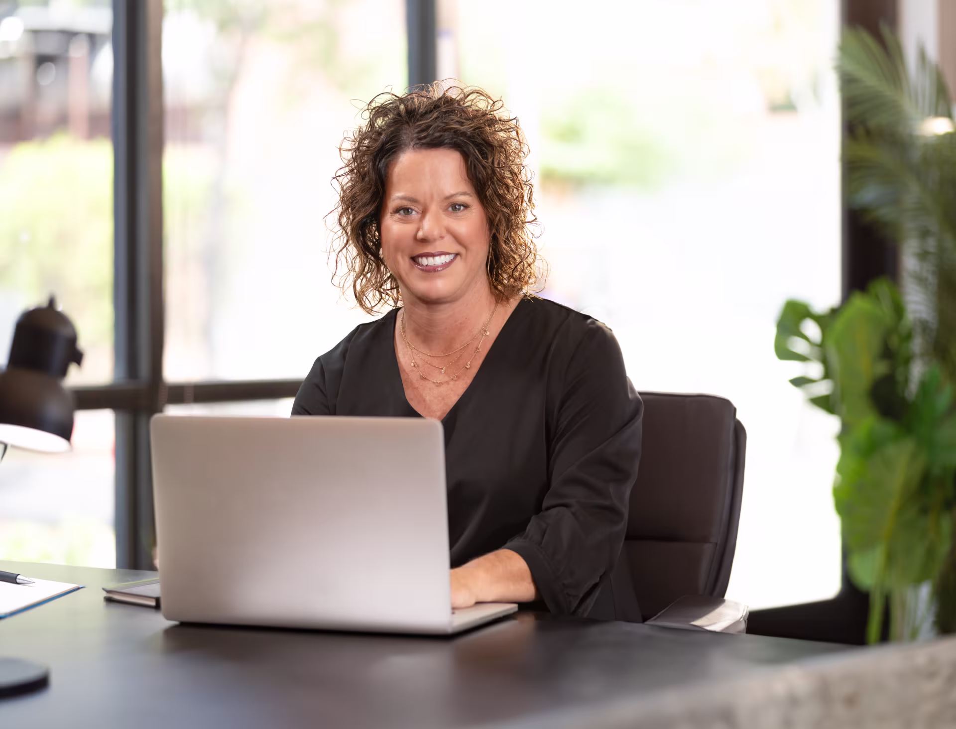 Life coach using laptop