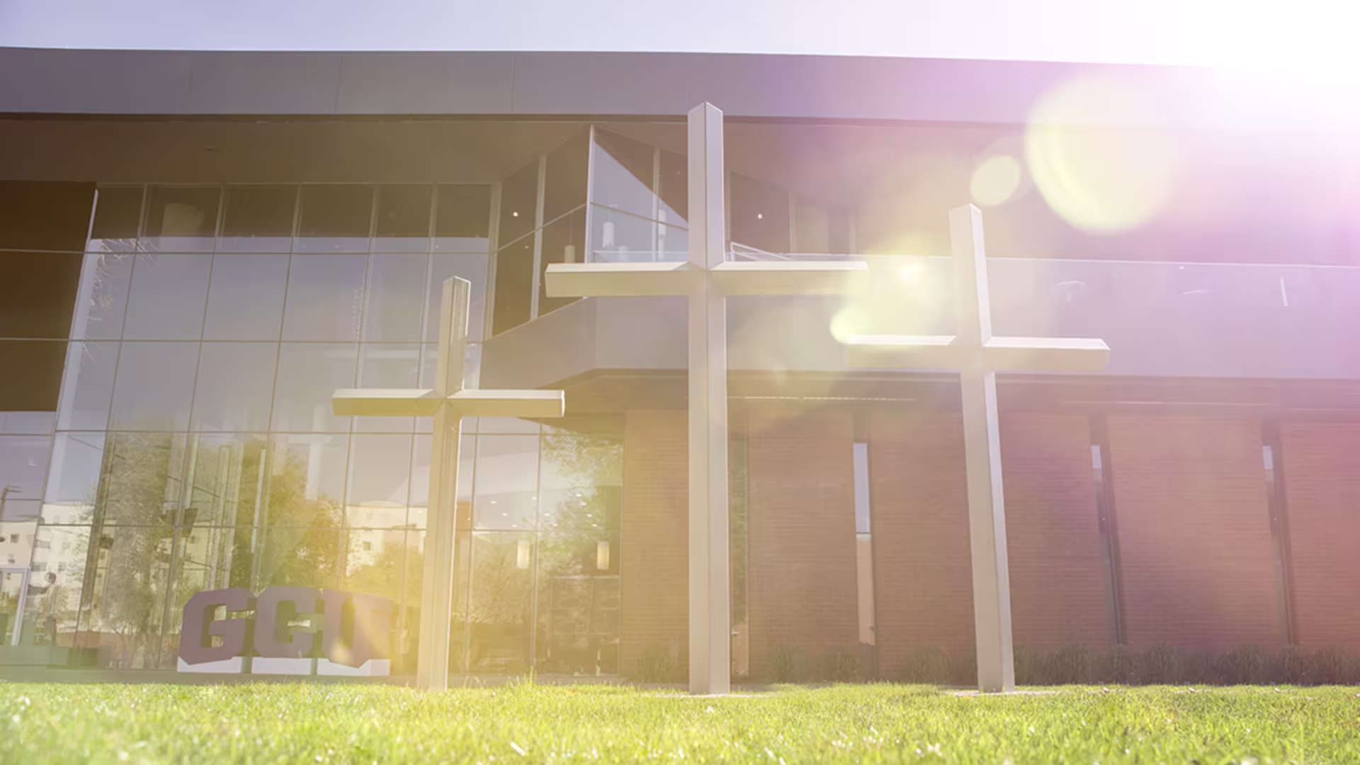 Cross statues outside of the College of Theology building