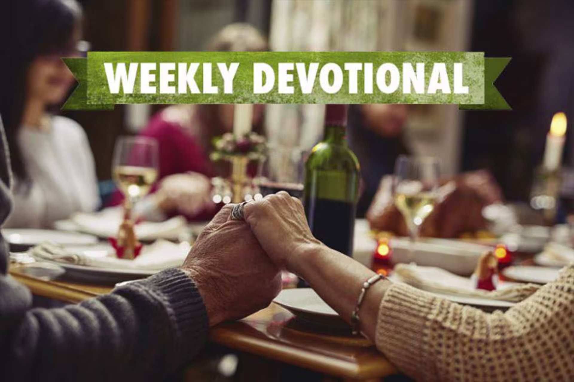 Weekly Devotional: Family praying over a dinner