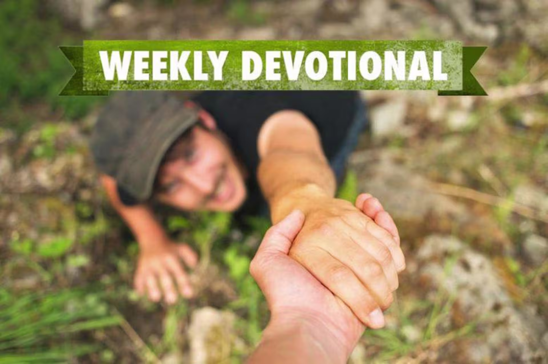 person helping someone up