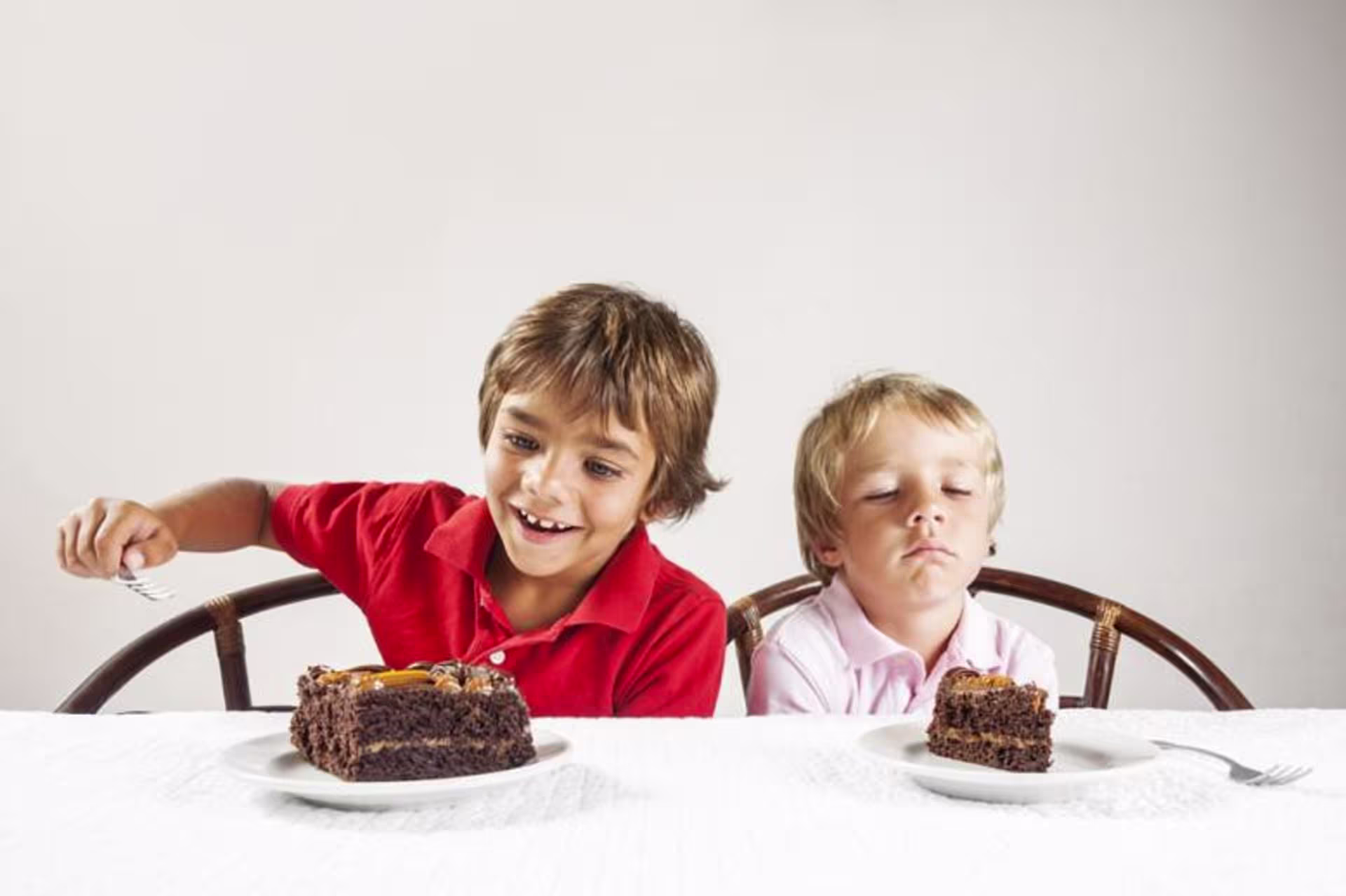 kids eating chocolate cake
