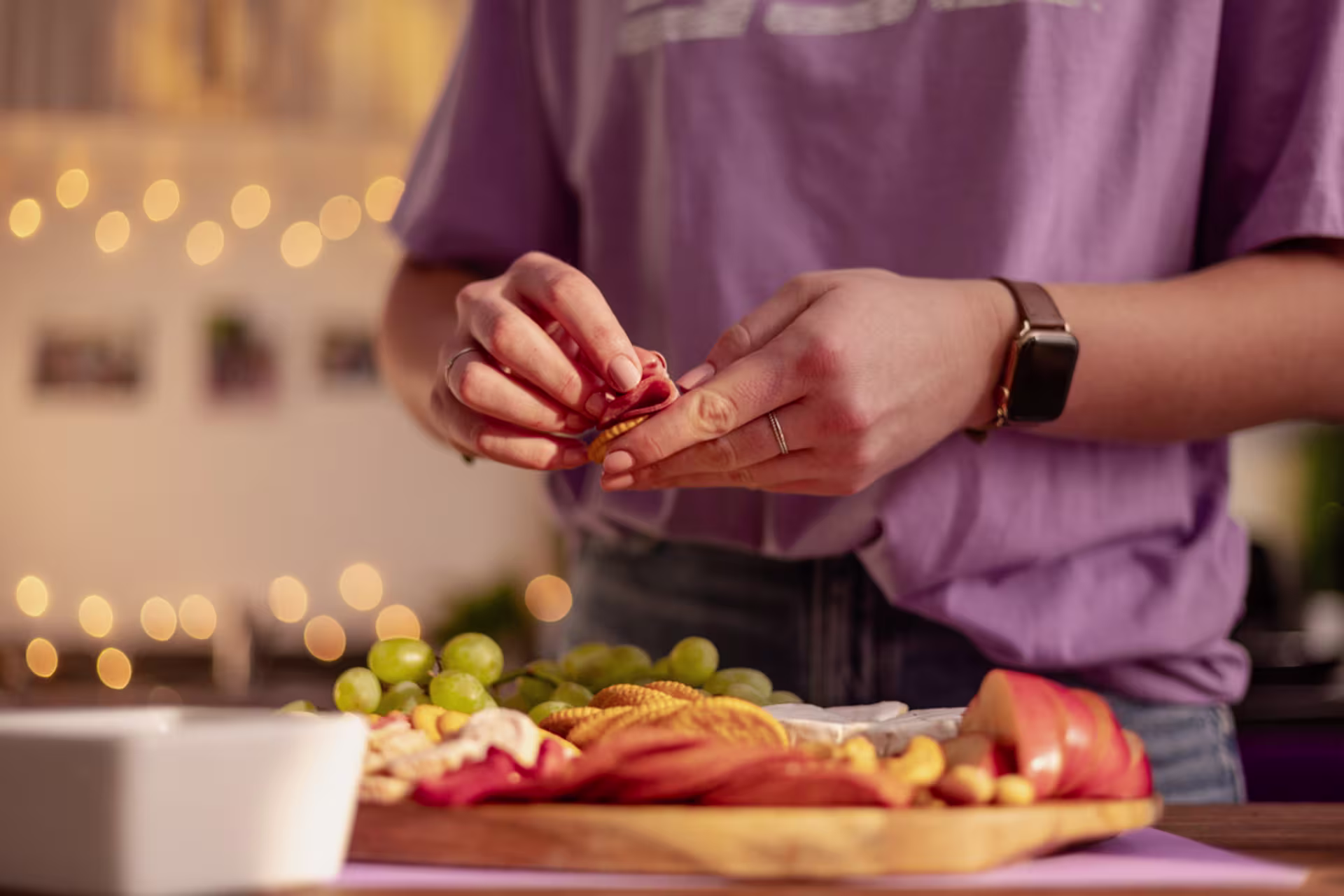Nutritional scientist prepares food on a countertop.