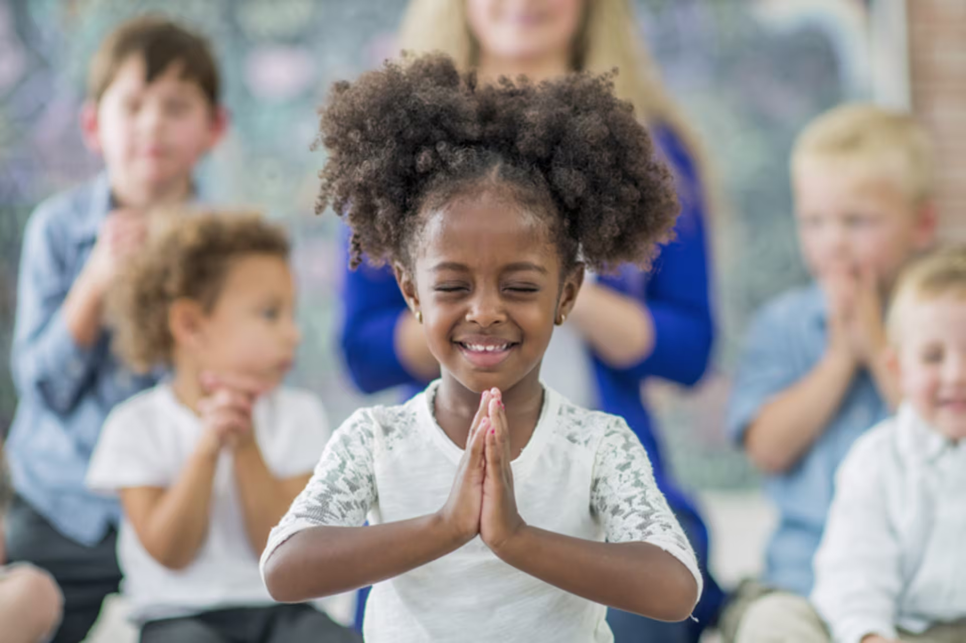 Kids praying at Sunday school