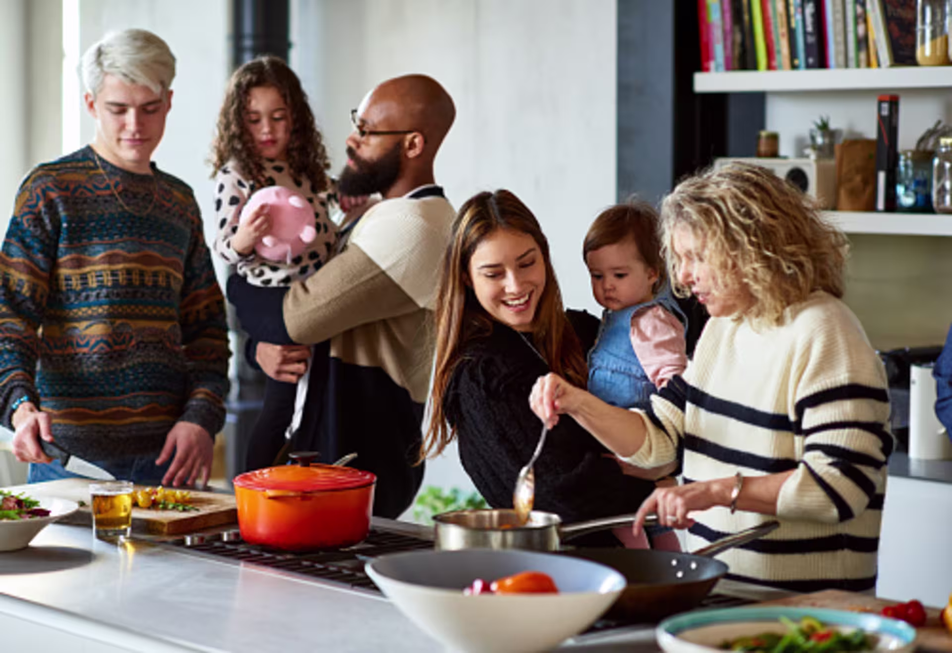 Generous host making meal for friends and family