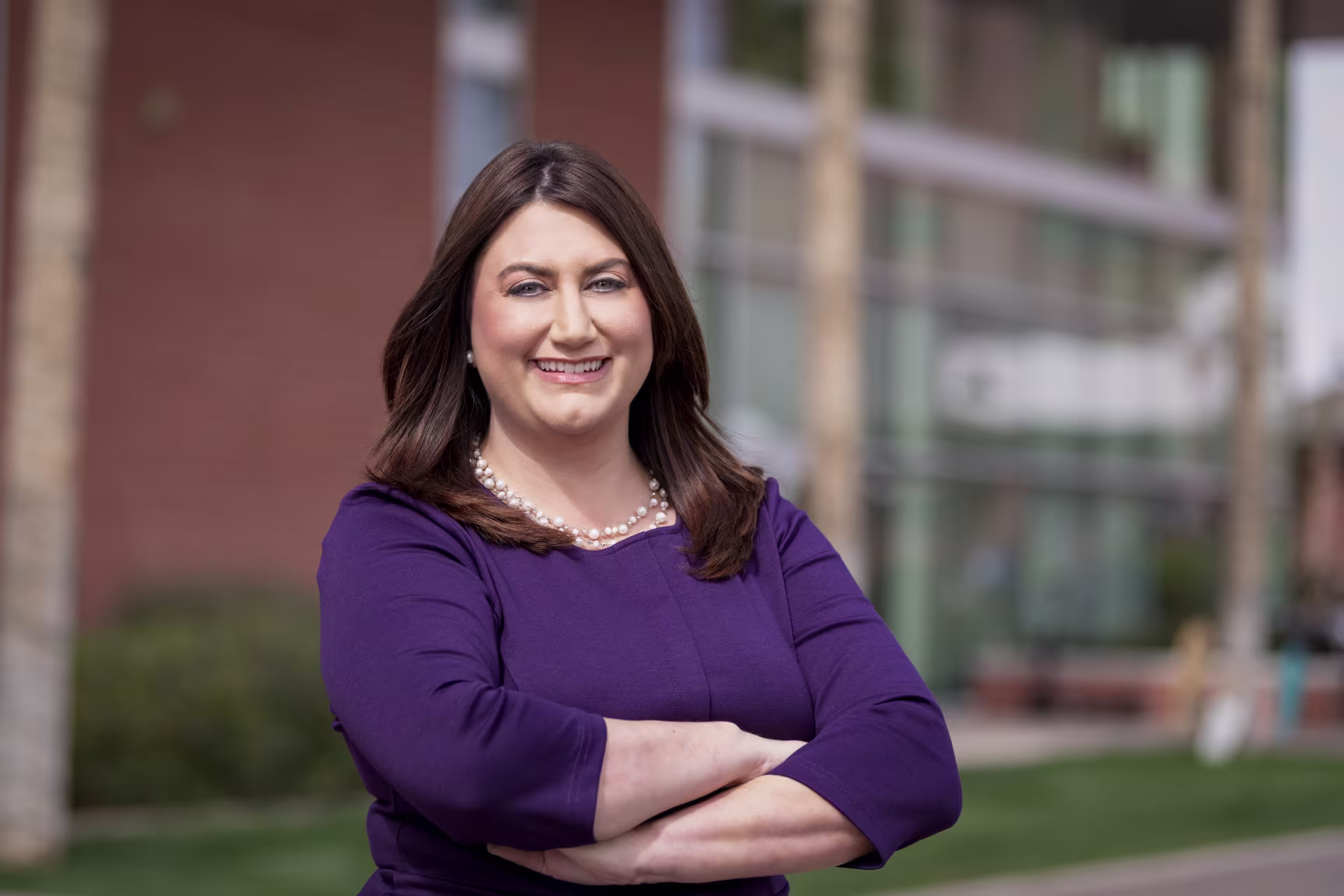 Woman crossing her arms and smiling