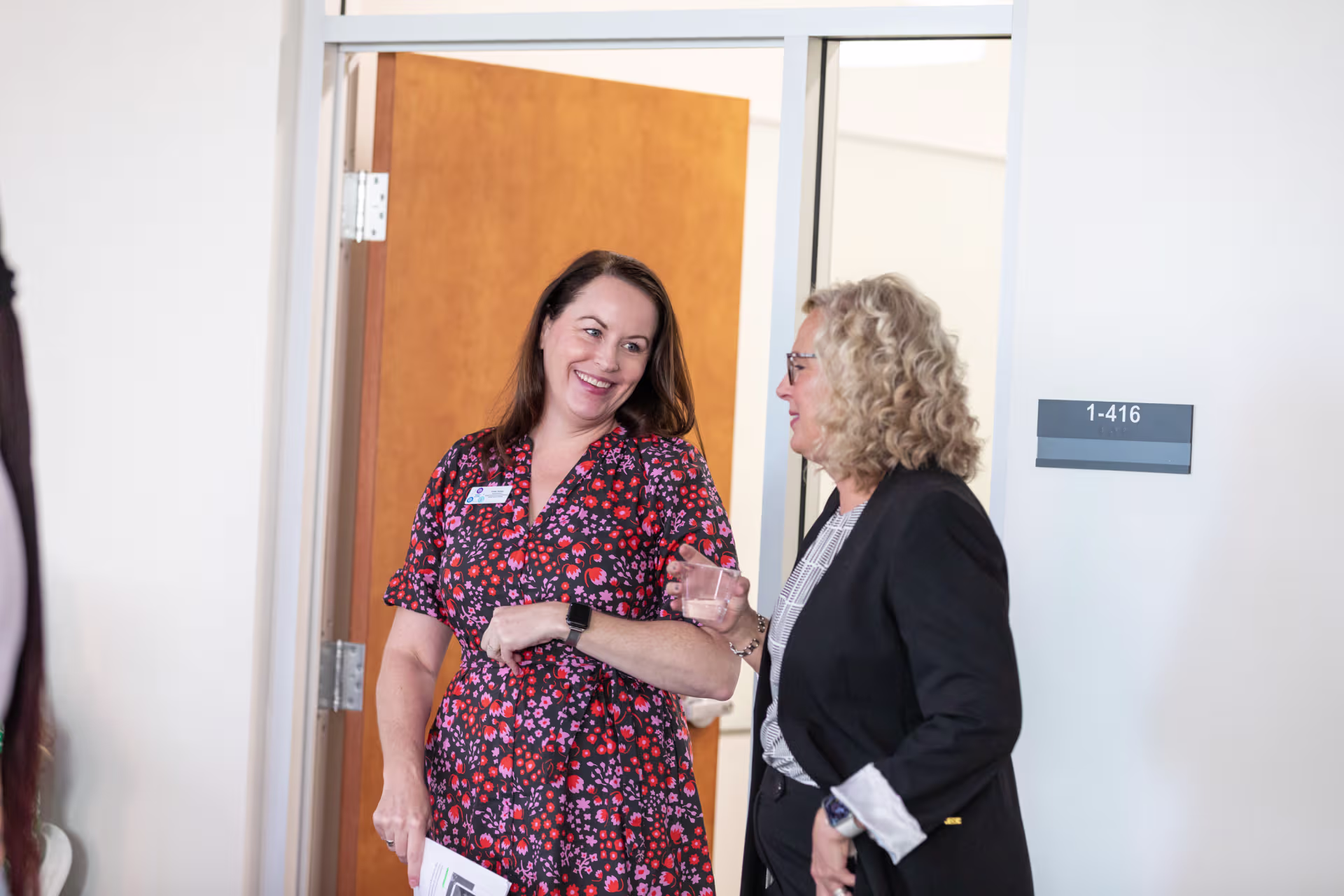Two women talking to each other discussing something