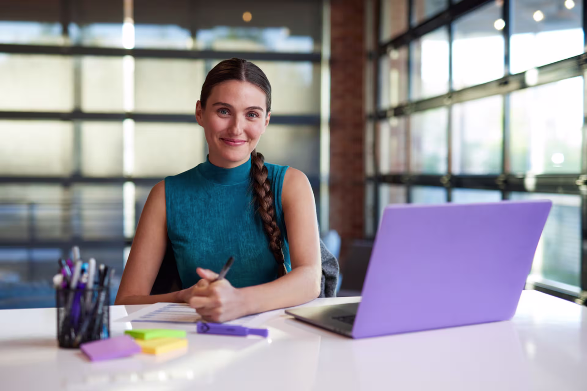 Security Professional Certificate student studying in a modern workspace designed for professional development.