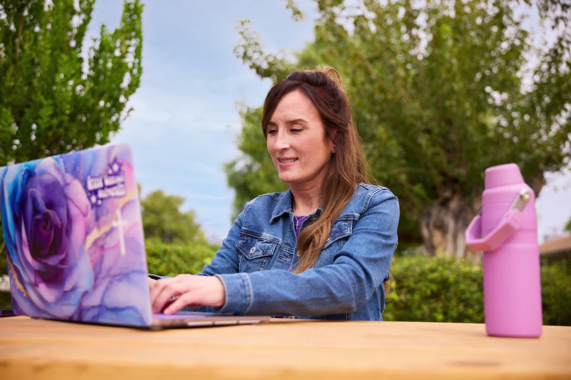 An online data science graduate student works on coursework and analytics projects from a remote location.