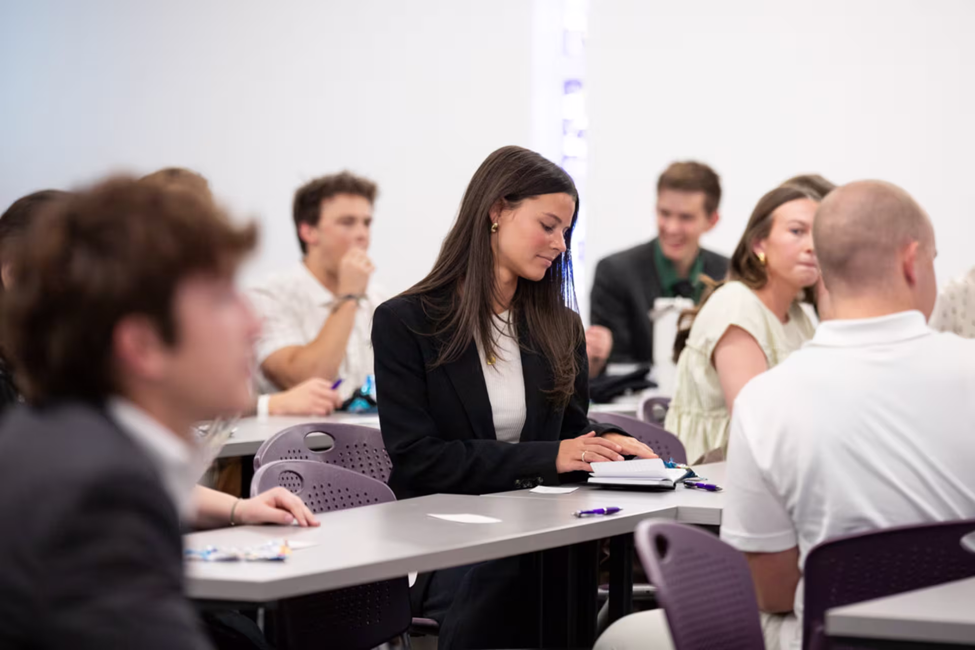 Organizational leadership students participate in a classroom discussion.