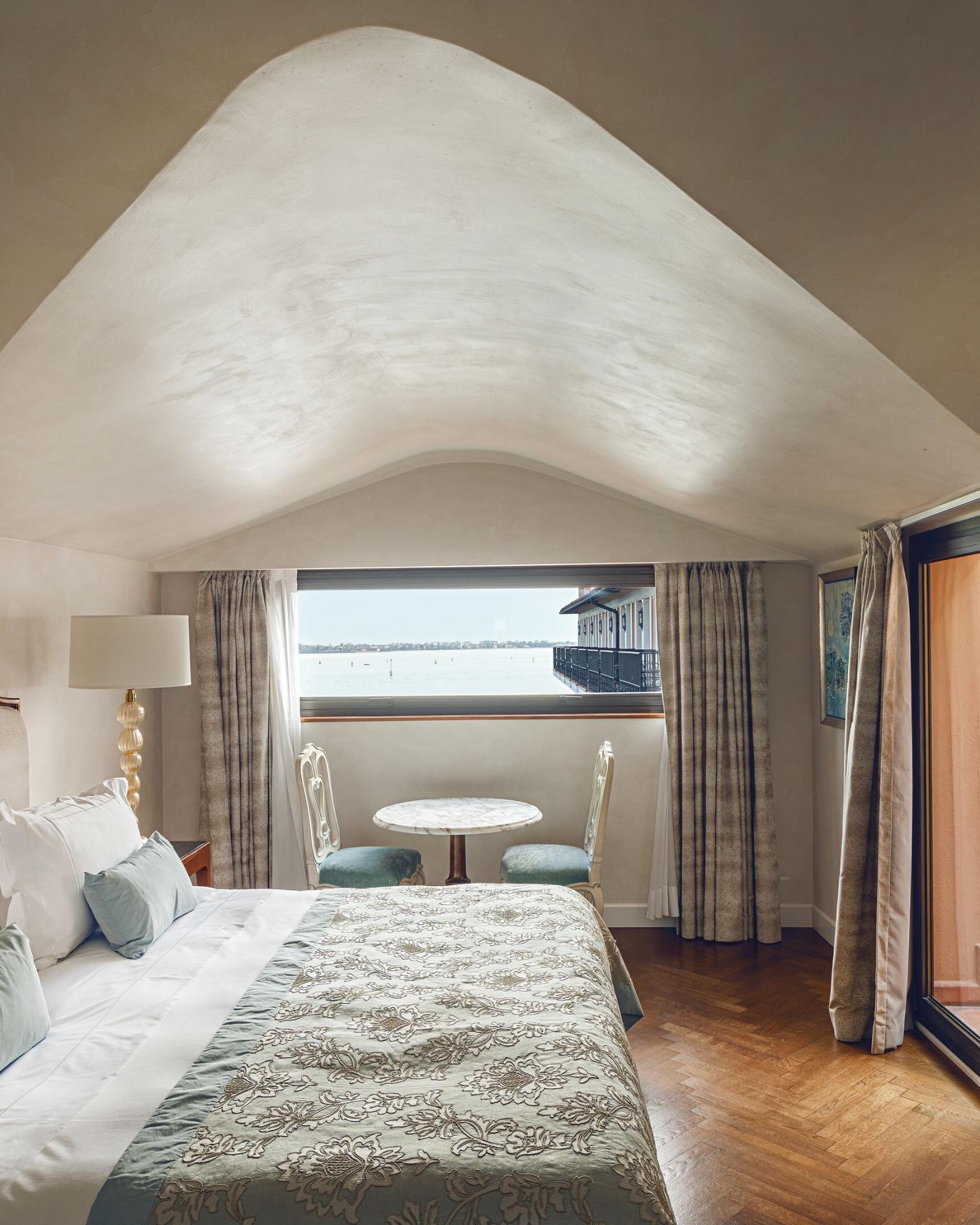 Junior suite lagoon view with balcony or terrace
