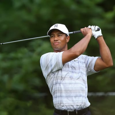 Tiger Woods drives by Allison edit1