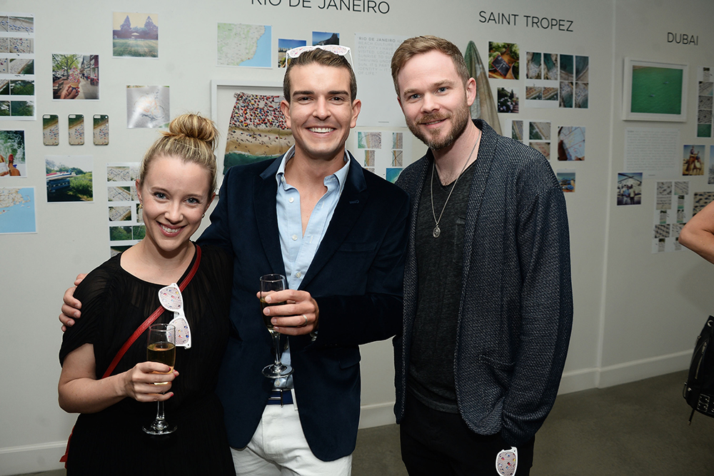 Dana Ashmore, photographer Gray Malin, and actor Shawn Ashmore attend the launch of Gray Malin's new book BEACHES at Eric Buterbaugh Floral on May 10, 2016 in West Hollywood, California. (Photo by Matt Winkelmeyer/Getty Images for Bollare)