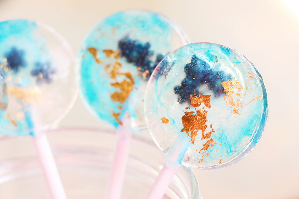 Lollipops inspired by Gray Malin's Bora Bora series via Nutmeg & Honeybee