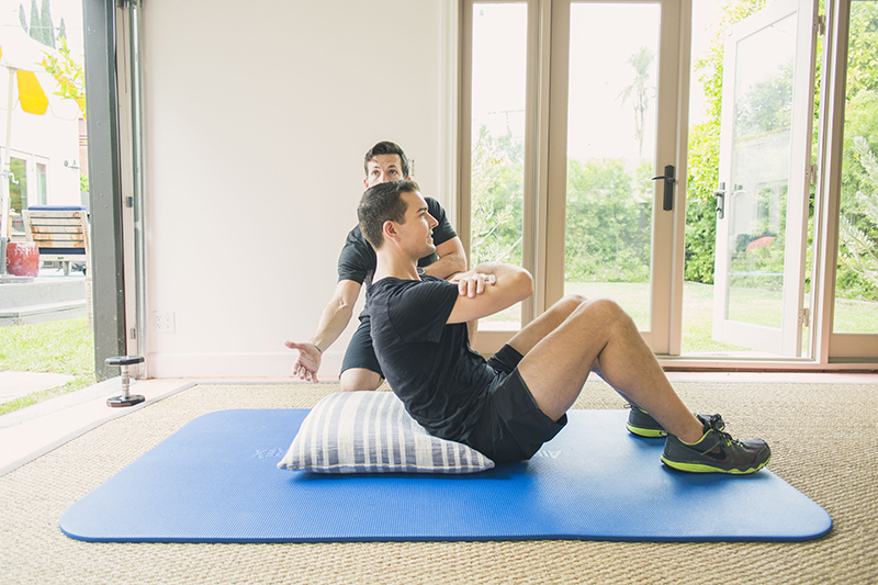 Sit ups with pillow under spine