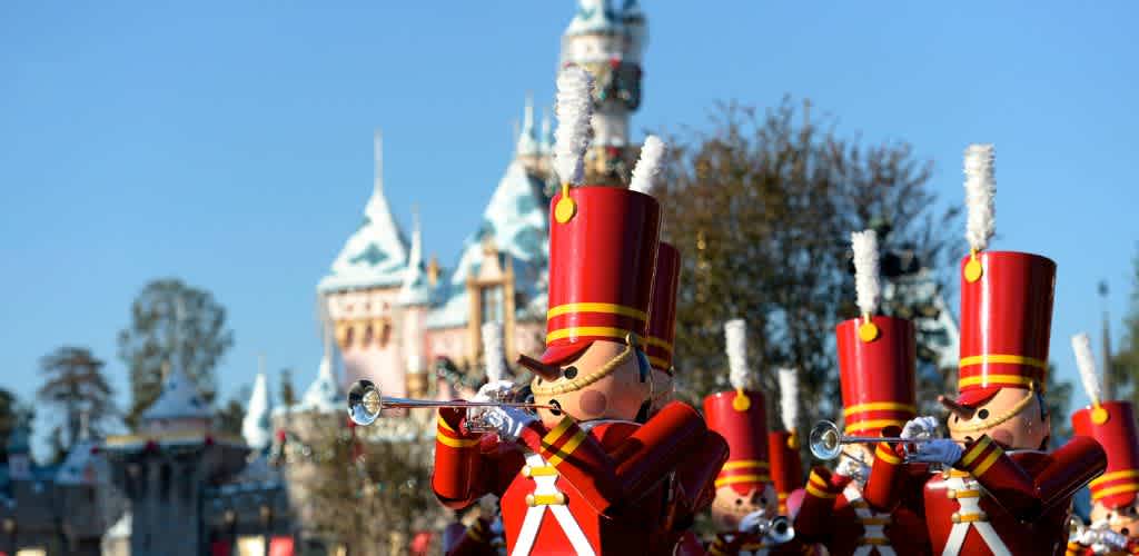 Toy soldier parade in front of a castle during daytime with a clear blue sky.