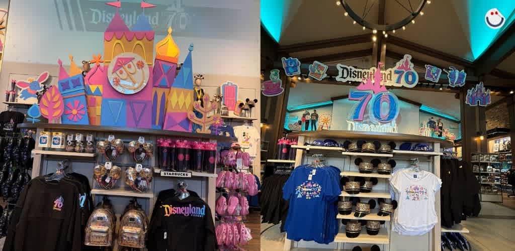 Colorful displays celebrate Disneyland's 70th anniversary, featuring themed merchandise like sweatshirts, t-shirts, mugs, and bags. The left display has a vibrant castle design, while the right features a 70th anniversary logo. Various items are arranged on shelves, with accessories and apparel prominently visible, creating a festive shopping experience.