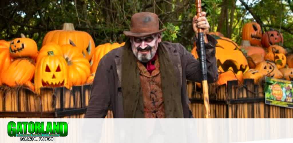 Man in costume with pumpkins at Gatorland, Orlando.