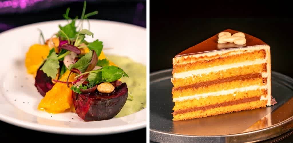 Side view of a colorful salad with beets, greens, and oranges on a white plate, and a layered caramel cake with frosting on a dark background.