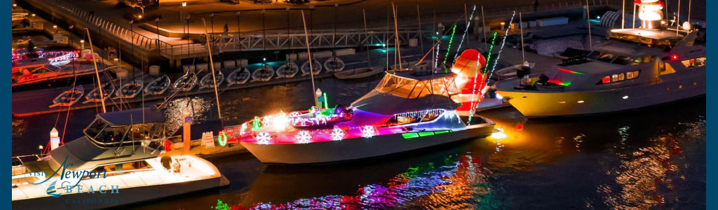 This image features an enchanting nighttime scene of a harbor with multiple boats adorned with vibrant holiday lights. The boats are docked in calm waters that reflect the dazzling lights, enhancing the festive atmosphere. The floating parade of lights includes strings of multicolored bulbs and holiday-themed decorations, such as a large lit-up Santa Claus figure sitting in a sleigh on the deck of one of the boats. Gentle glimmers on the water's surface add to the magical quality of the setting. The dark sky contrasts with the illuminated boats, casting them as the focal point of the image. In the background, the outline of a bridge can be observed, partially illuminated by adjacent streetlights. The logo “Newport Beach California” can be seen at the bottom center of the picture, suggesting the location of the scene.

Looking to experience this spellbinding display in person? Greatworkperks.com offers you the chance to witness these captivating light displays at the harbor with exclusive discounts, ensuring you enjoy the lowest prices on tickets for your next festive adventure.