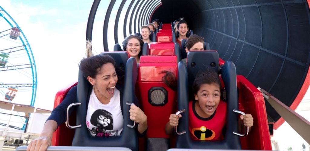 Guests screaming with excitement on the Incredicoaster at Disney California Adventure Park.