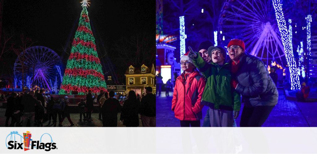 Image of a Six Flags theme park during a festive event at night. On the left, a large, brightly lit Christmas tree towers over onlookers, with a Ferris wheel in the background. On the right, a joyful group of four, bundled in winter attire, poses for a photo with brilliant blue and white holiday lights adorning the trees and structures around them.