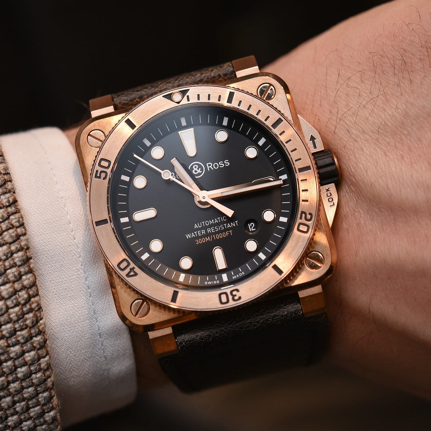 Bell & Ross gold and steel watch on wrist