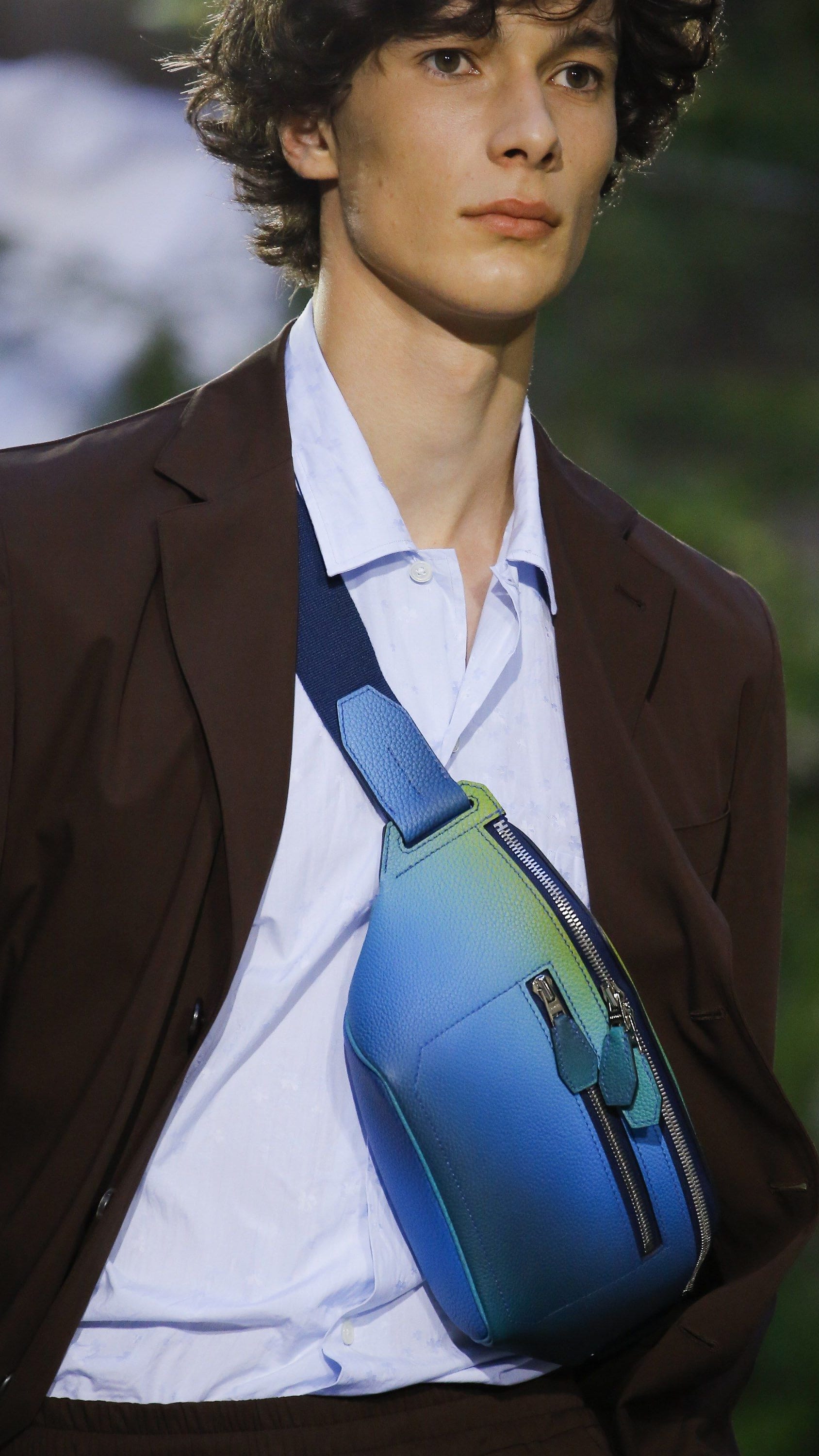 Model wears new Hermes spring summer 2020 belt bag on runway