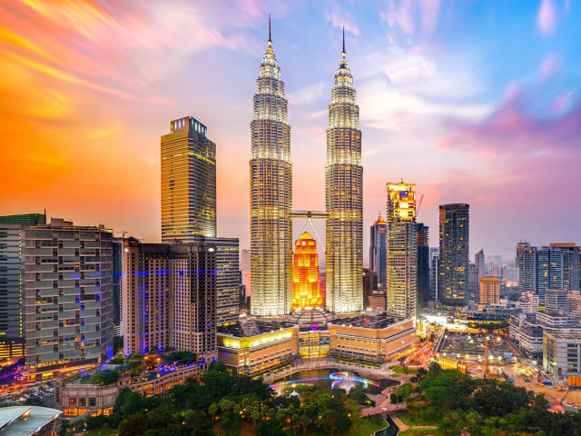 Quick and Reliable Malaysia Visa Processing in Dubai - Green Apple Travel & Tourism - Professional Visa Application Service in UAE