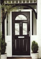 Glass-panelled black composite door