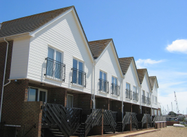 Coastal flats with maintenance-free windows, doors, and cladding.