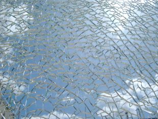 A shattered toughened glass window