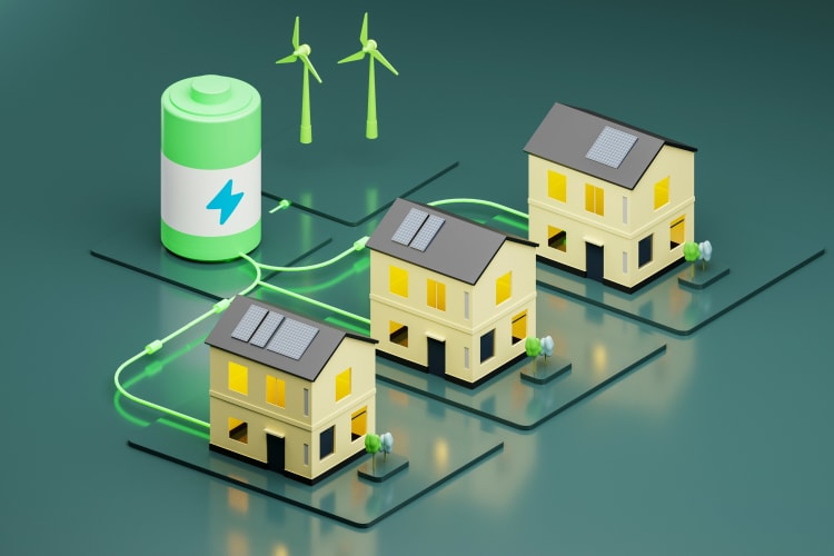 Drei Häuser die an eine Batterie angeschlossen sind und Windkrafträder daneben null