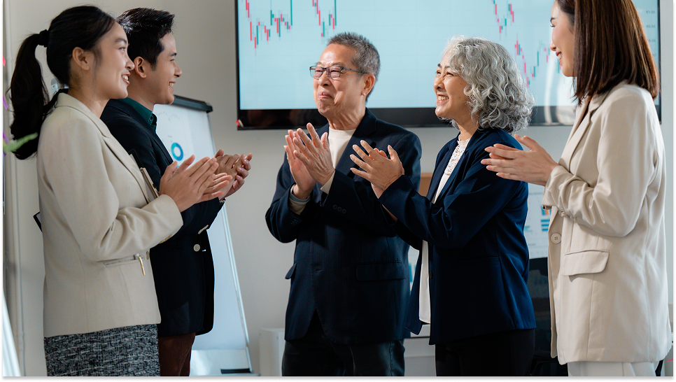 asian-businesspeople-clapping-hands-after-success