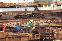 A worker at a Union Pacific Intermodal Terminal rail yard.